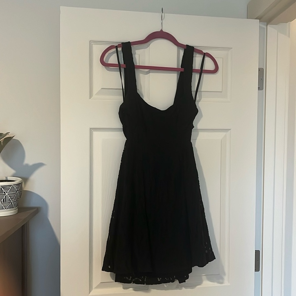 Free people size 6 black dress. Worn a few times, but in good condition.